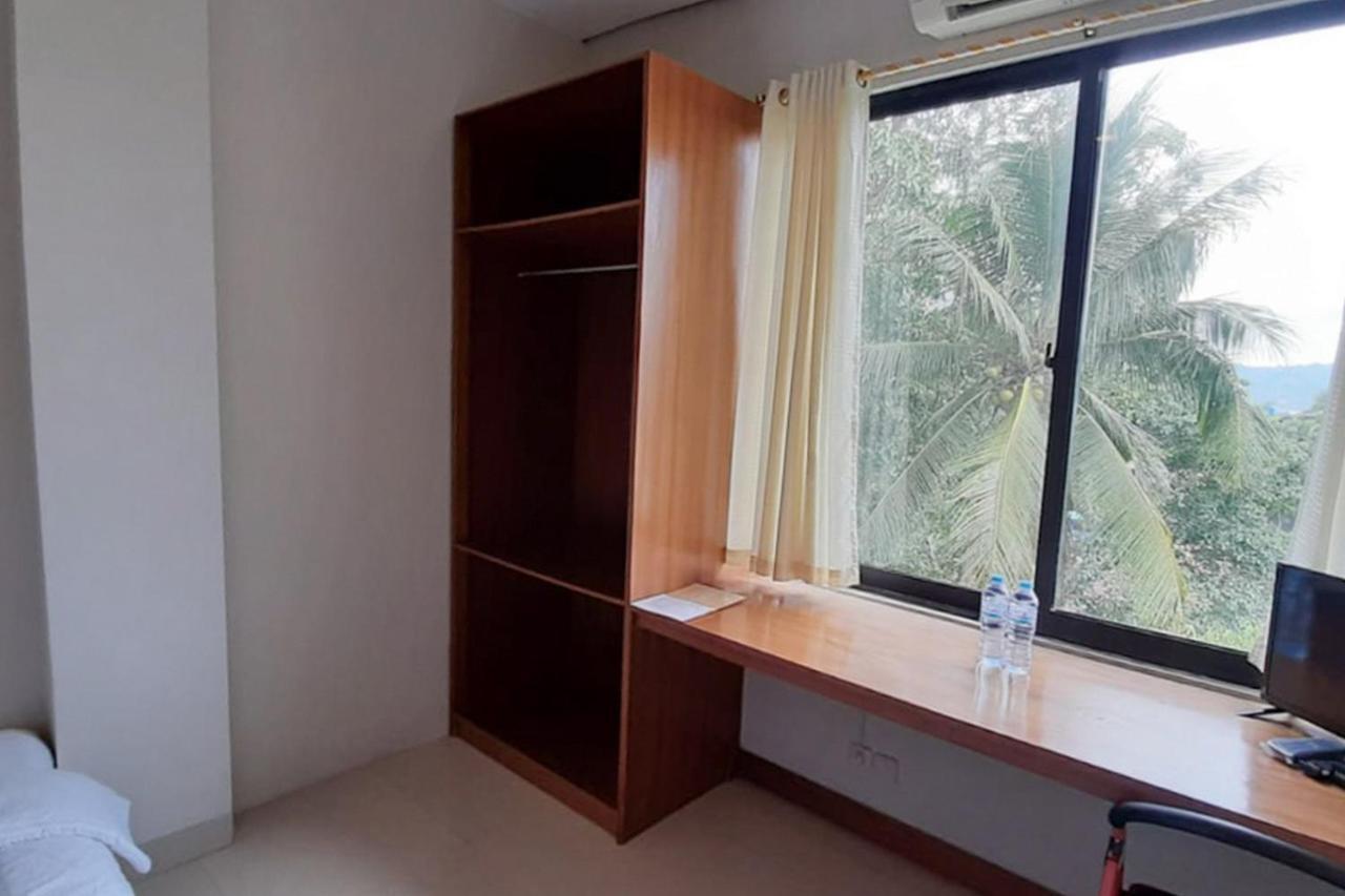 Reddoorz Plus @ Bitung City Center Экстерьер фото
